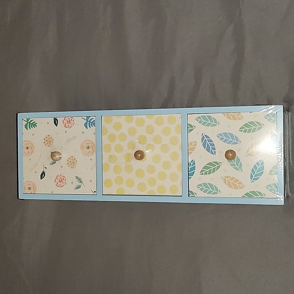 Brand new in plastic 3 drawer jewelry box.